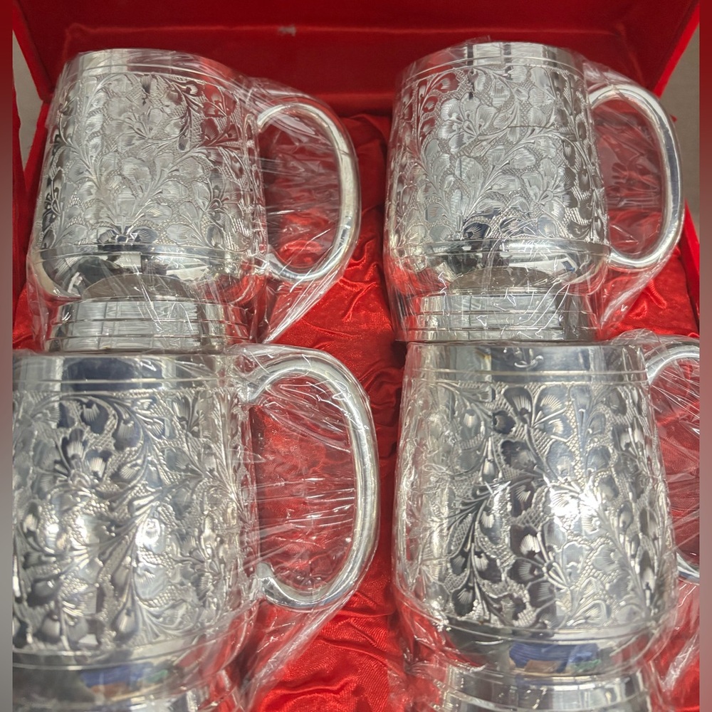 Set of Four Silver Floral Mugs
